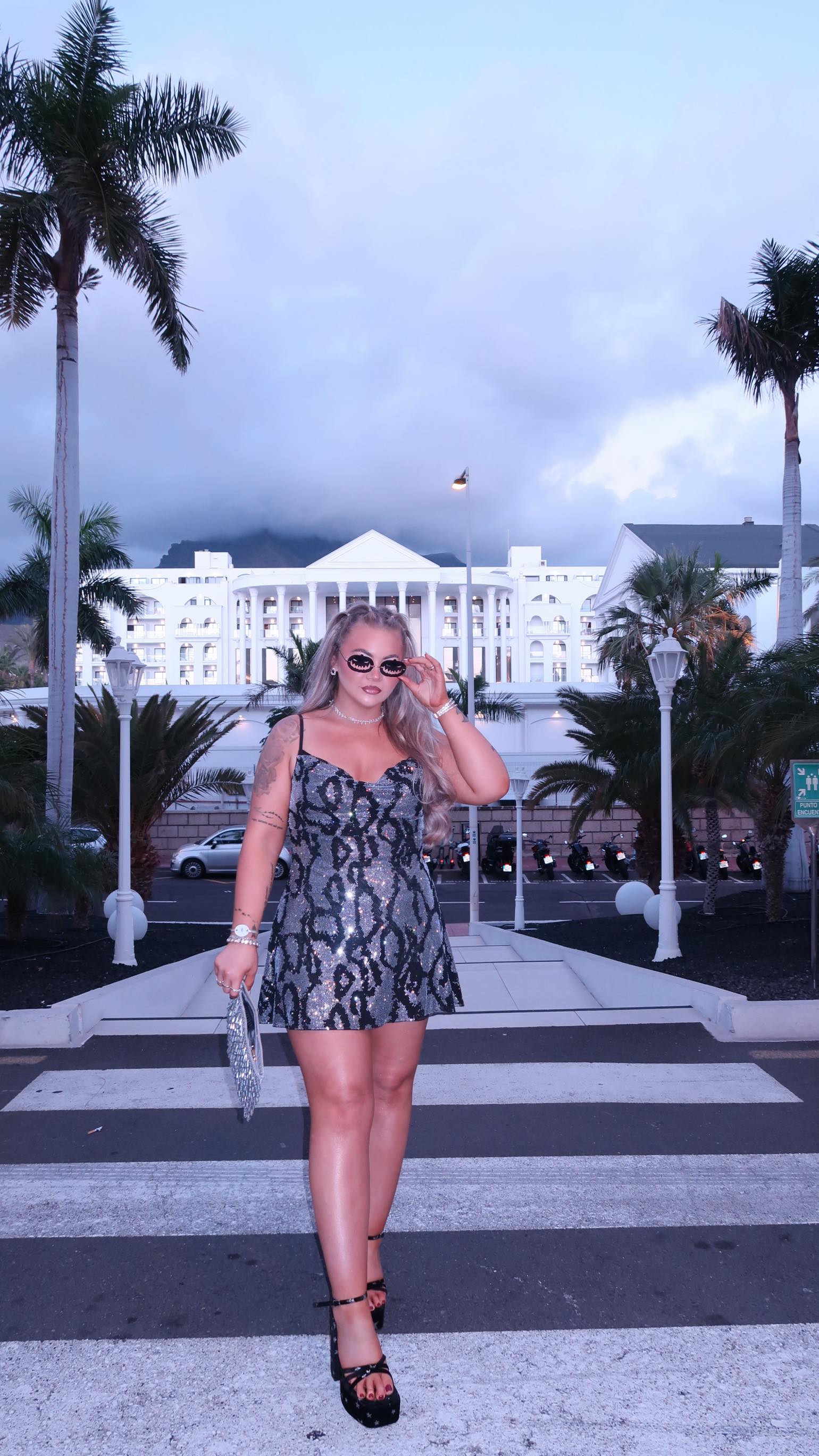 Instagram post by @abigailvancee for OH POLLY. Caption reads: If anyone asks, I’m a snake 🐍.