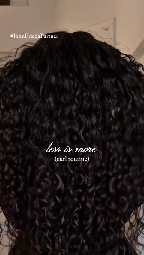 Instagram post by an influencer for John Frieda US. Caption reads: [...] for defined curls using @johnfriedaus 💜....