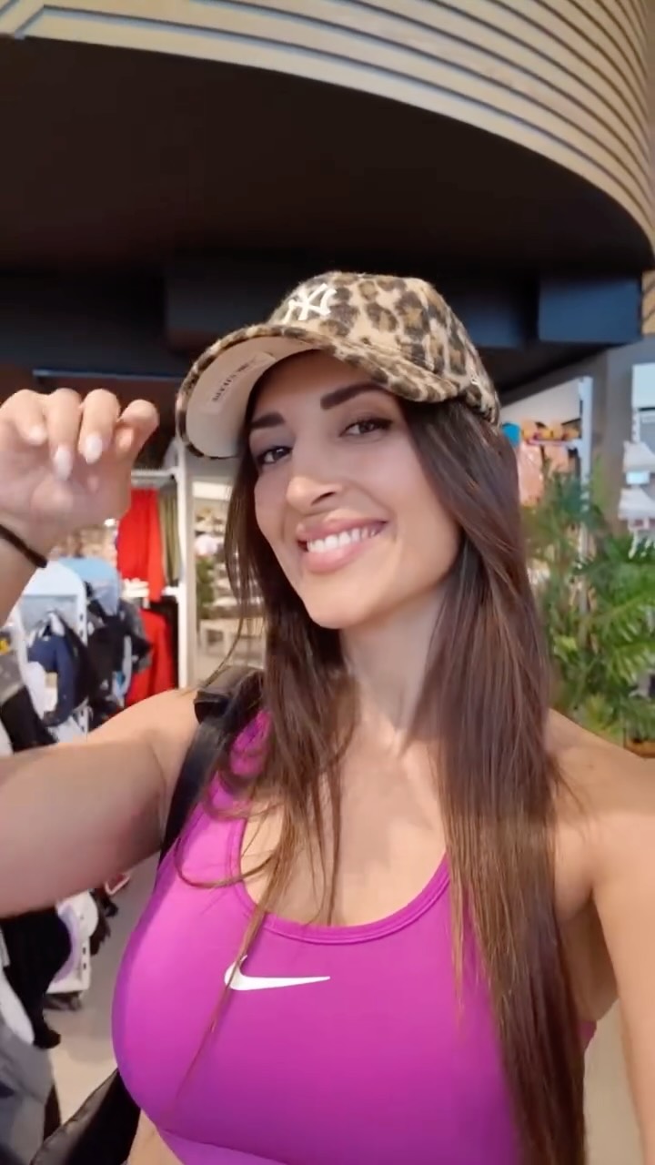 Instagram post by @evi.sa for INTERSPORT. Caption reads: 🖤 Black Month is on!
Τρέξε στον απόλυτο προορισμό....