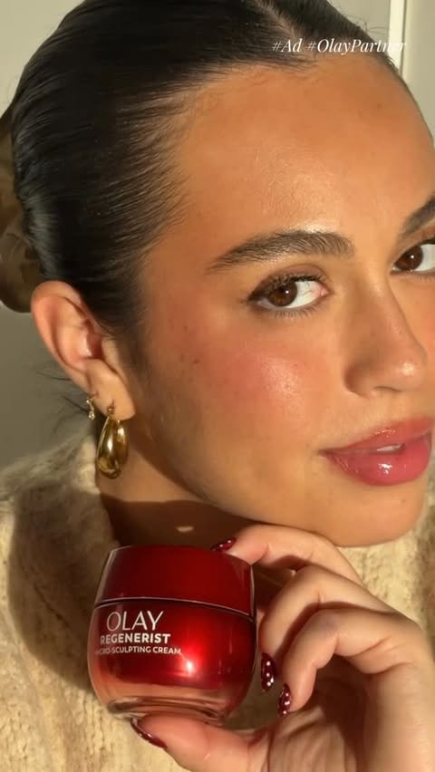 Instagram post by @sarita.cu for OLAY. Caption reads: #ad #OlayPartner If I could tell younger me ONE....