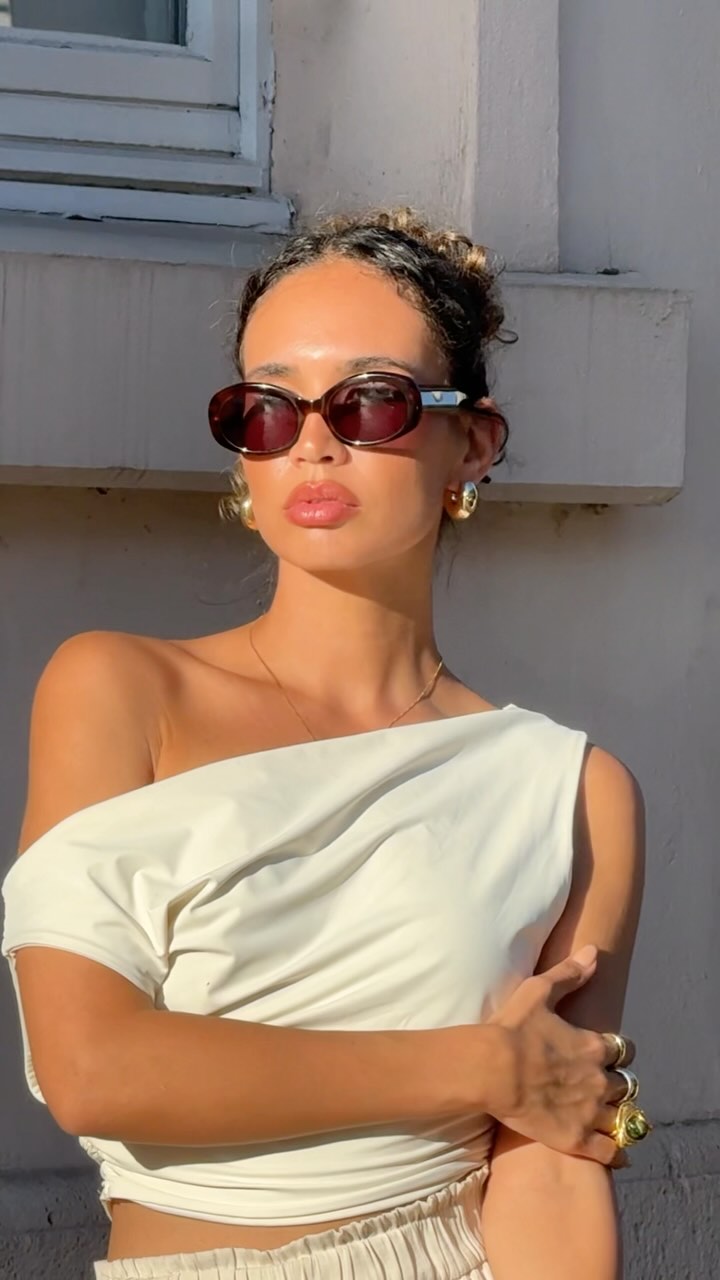 Instagram post by @sabrinkrstc for Le Petit Lunetier. Caption reads: Sun was too loud. 

@lepetitlunetier 

Ad |....