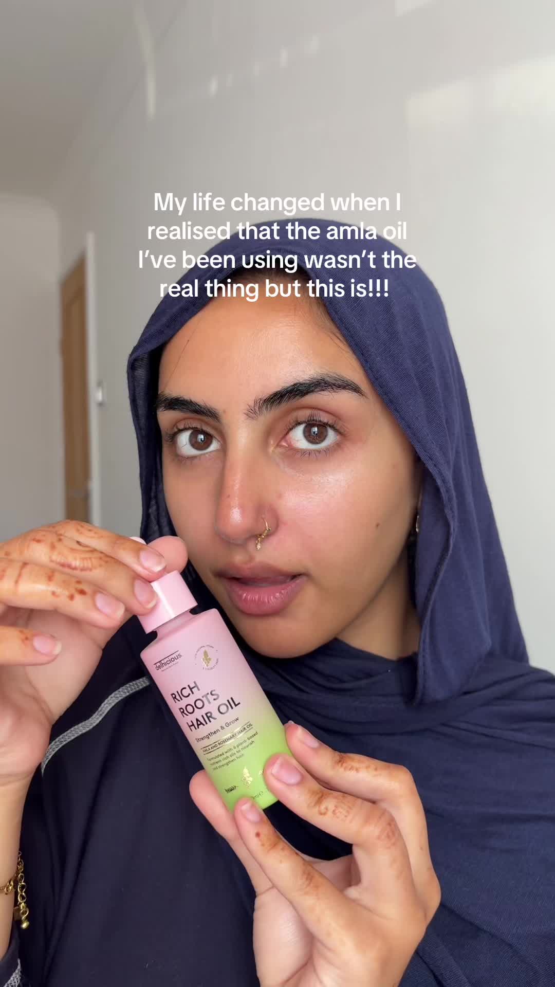 TikTok post by @ugcdiaries for Delhicious Body. Caption reads: @Delhicious have a natural authentic Amla oil and....