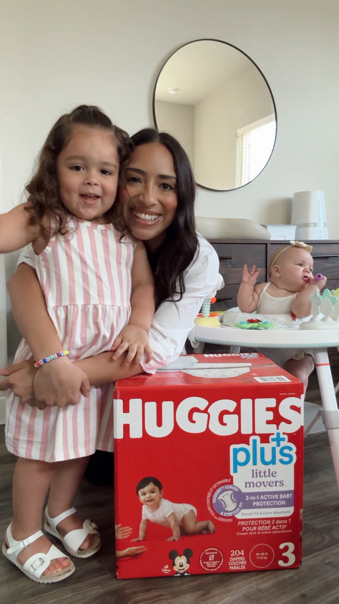 Instagram post by @joeyandcynthia for Huggies. Caption reads: #ad Restocking our Diaper Station with my favorite....