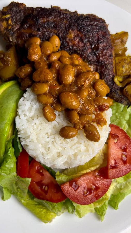 Instagram post by @typhaniecooks for Loisa. Caption reads: [...] beans, rice, and tostones using @eatloisa.....