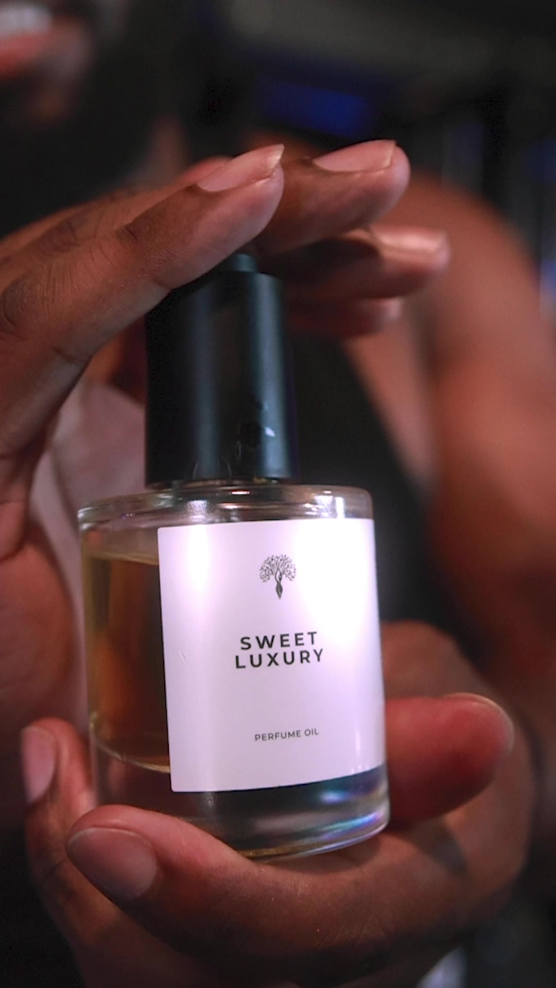 TikTok post by @ekemxsam for Eternal Perfume Oils. Caption reads: Oil up!! @Eternal Perfume Oils.