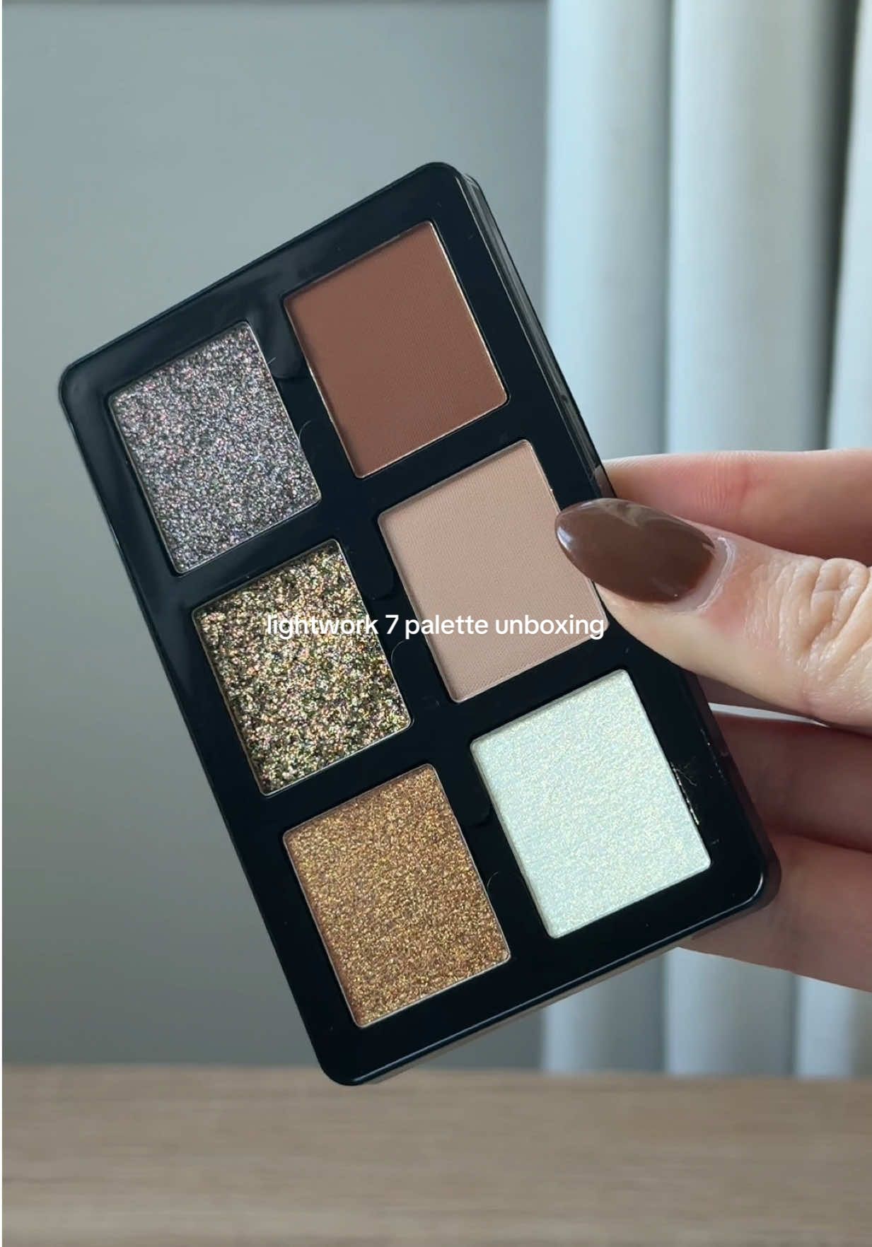 TikTok post by @vanessampaivaa for Danessa Myricks Beauty. Caption reads: lightwork 7 palette unboxing ✨....