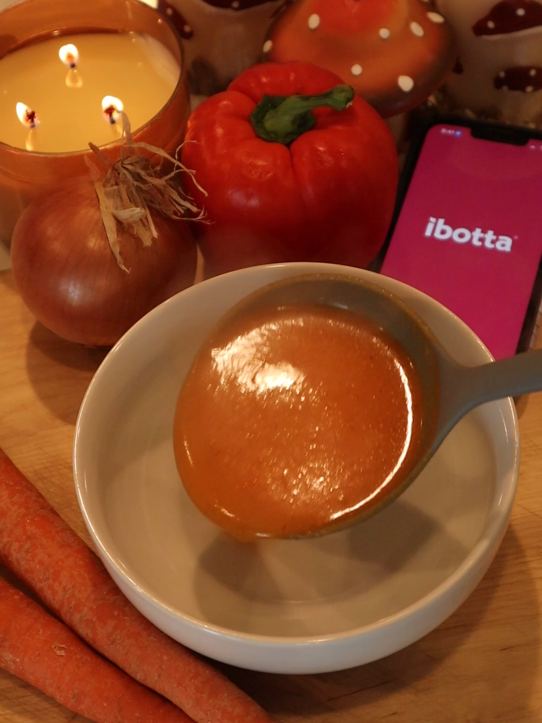 TikTok post by @dollartreedinners for Ibotta. Caption reads: A bowl of creamy roasted vegetable soup and a....