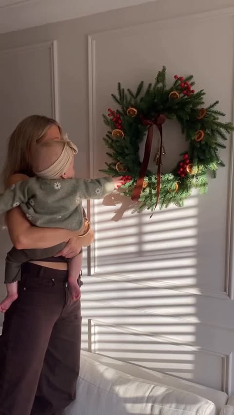 Instagram post by @bethany.homeinterior for The Range. Caption reads: [...] this beautiful realistic wreath from....