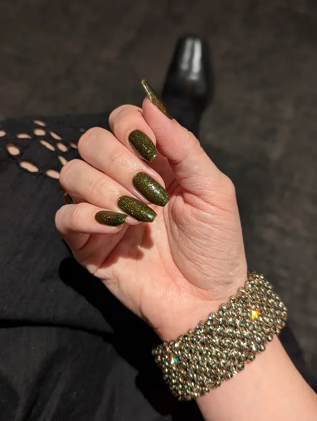 Instagram post by @nicholeleigh.nails for Cracked Polish. Caption reads: 🫒🍸🐊 @crackedpolish On Repeat 🐊🍸🫒 from the....