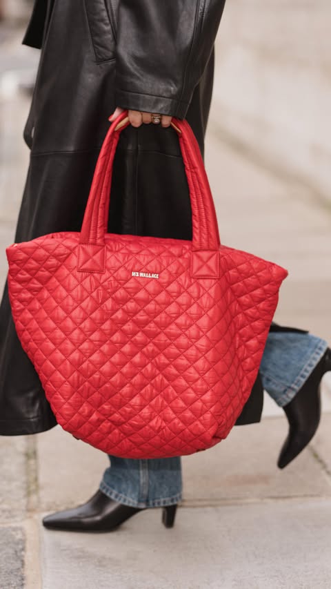 Instagram post by @emmarosethatcher for MZ Wallace. Caption reads: [...] with four practical, functional MZ Wallace....