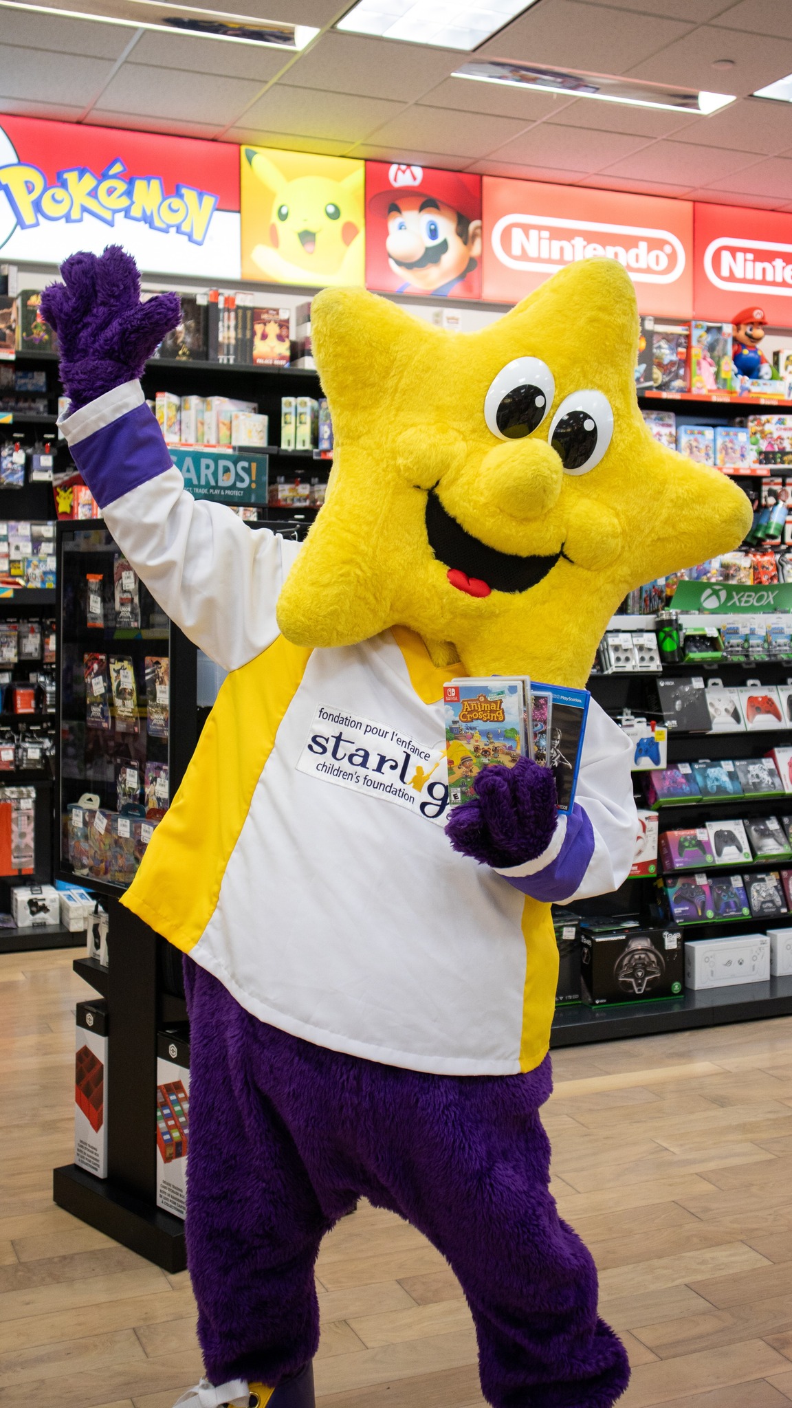 Instagram post by @starlightcanada for GameStop. Caption reads: Trade in and change lives with @ebgamescan. ♻️🎮....