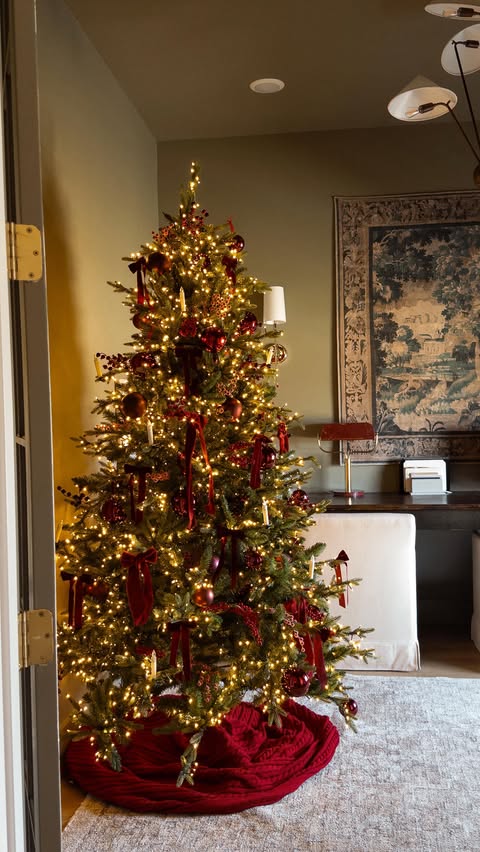 Instagram post by @accordingtomandy for LIKEtoKNOW.it. Caption reads: How to style a throw blanket this holiday....