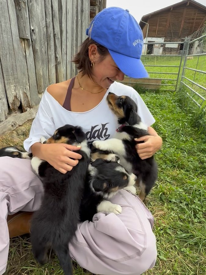 Instagram post by @isa.loetscher for ROXY. Caption reads: [...] bike:) -> off to austria now! #roxy....