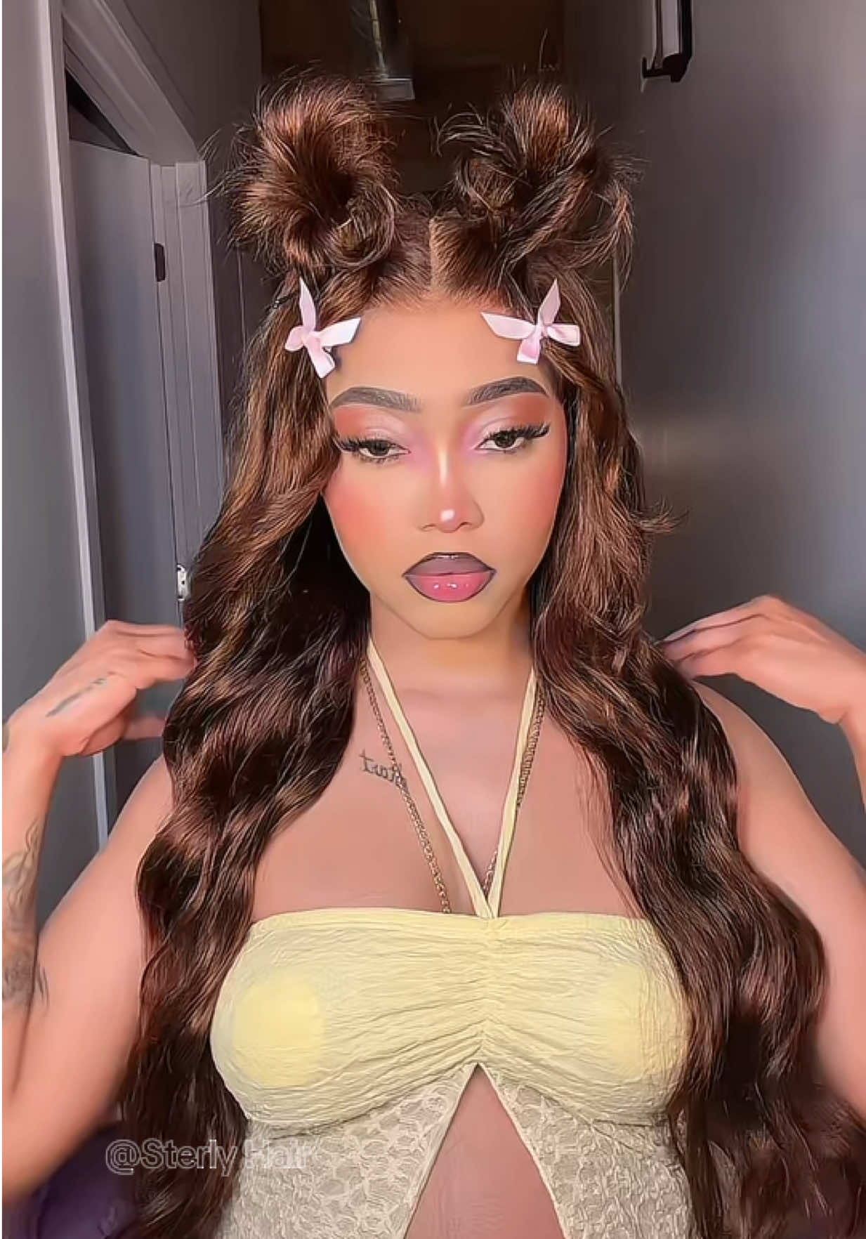 TikTok post by @yaatiff for Sterly Hair. Caption reads: @sterlyhair @sterlyhair the brown shade is hitting....