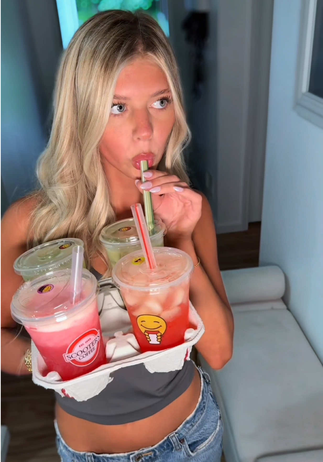 TikTok post by @summermcdermaid for Scooter's Coffee. Caption reads: [...] be combined with other promotions.)....