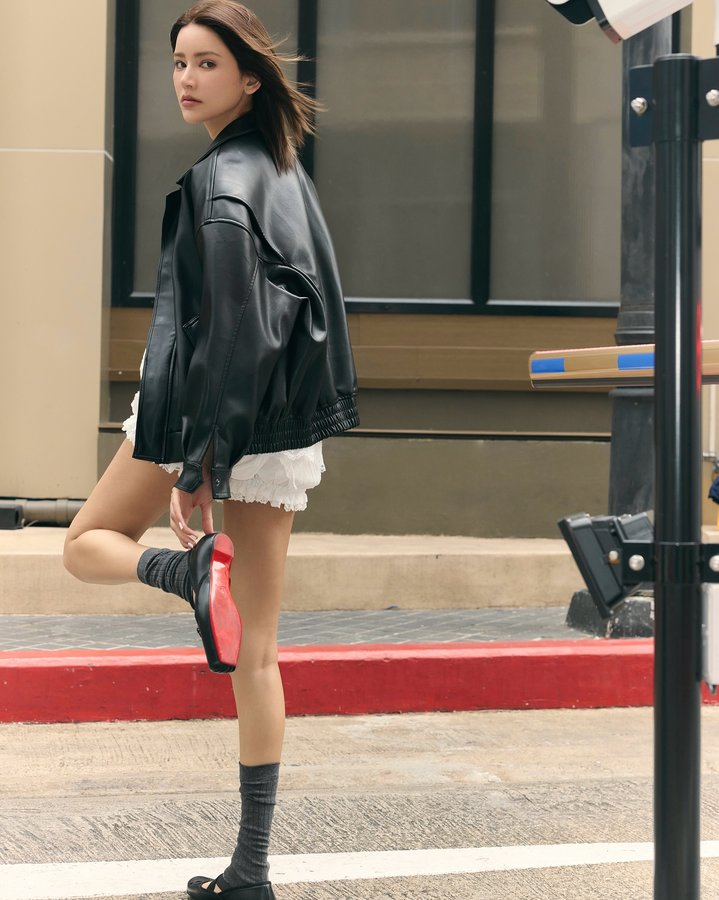 Instagram post by @ice_amena for Christian Louboutin. Caption reads: Soft steps, strong statement....