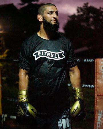 Instagram post by @khamzat_chimaev for RDX Sports. Caption reads: Let’s smash everyone together @rdx_sports 👊🏼💥.