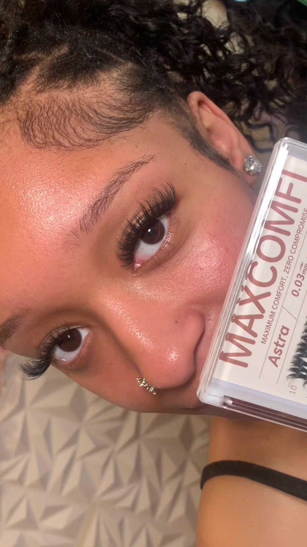 TikTok post by @tiny.nya_ for MaxComfi Lashes. Caption reads: These “Astra“ style lashes from @MaxComfi Lashes....