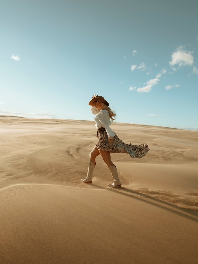 Instagram post by @rawimagephotography_ for Salty Crush. Caption reads: Lost in the desert 🏜️ , found in my boots 👢....