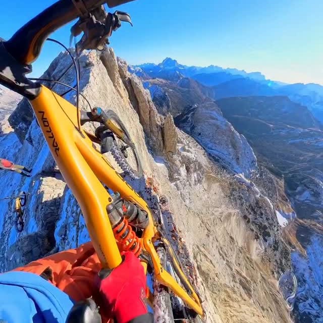 Instagram post by @marcobassot for Insta360. Caption reads: Touching the void on the most breathtaking ridge....