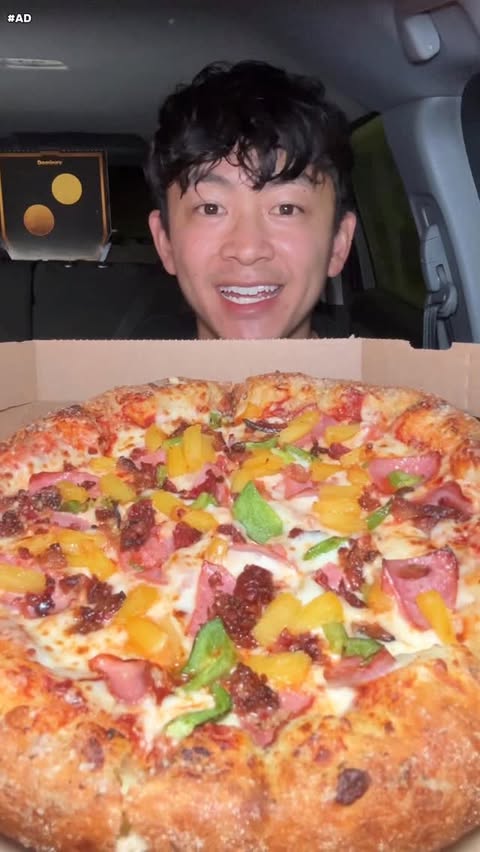 Instagram post by @thejcheneats for Domino's Pizza. Caption reads: #ad @dominos is back at it again with the Best....