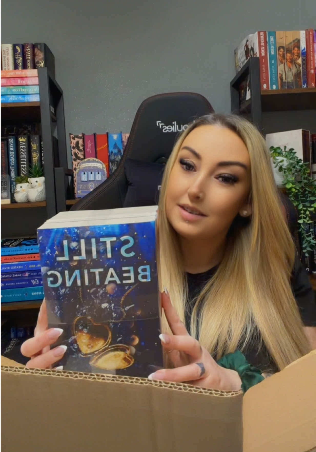 TikTok post by @laur_kemp for Books2Door. Caption reads: Open a @Books2Door haul with me 🤍 I am so happy....