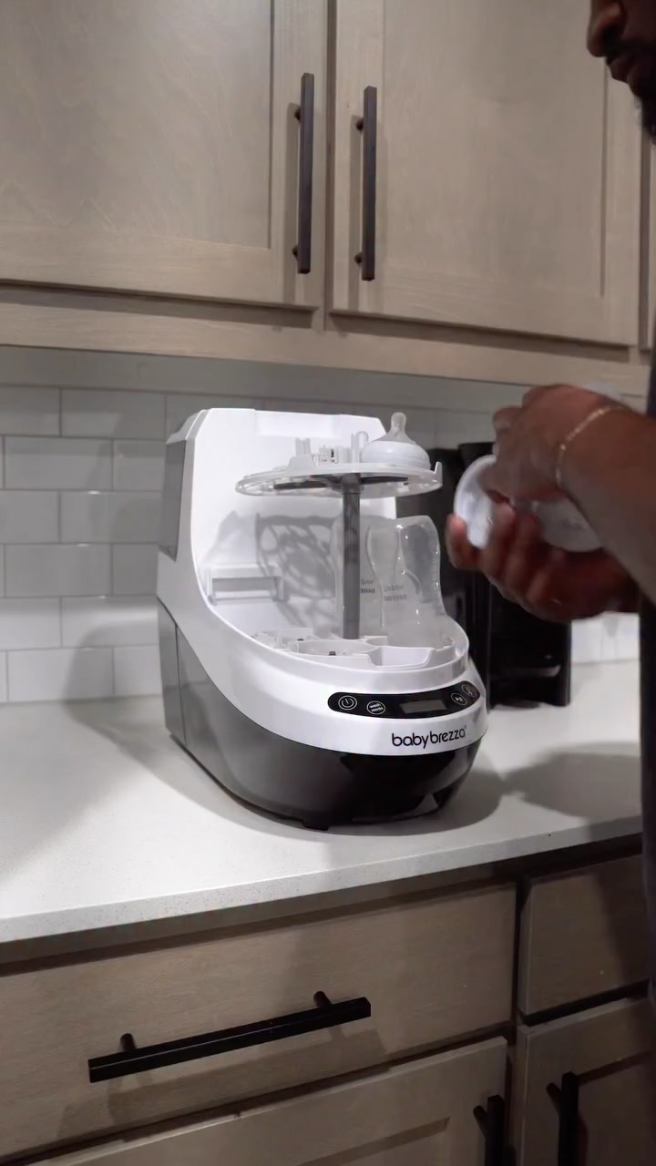 Instagram post by @aaronnmarkss for Baby Brezza. Caption reads: Hear me out...

Dad works 10+ hours a day, and....