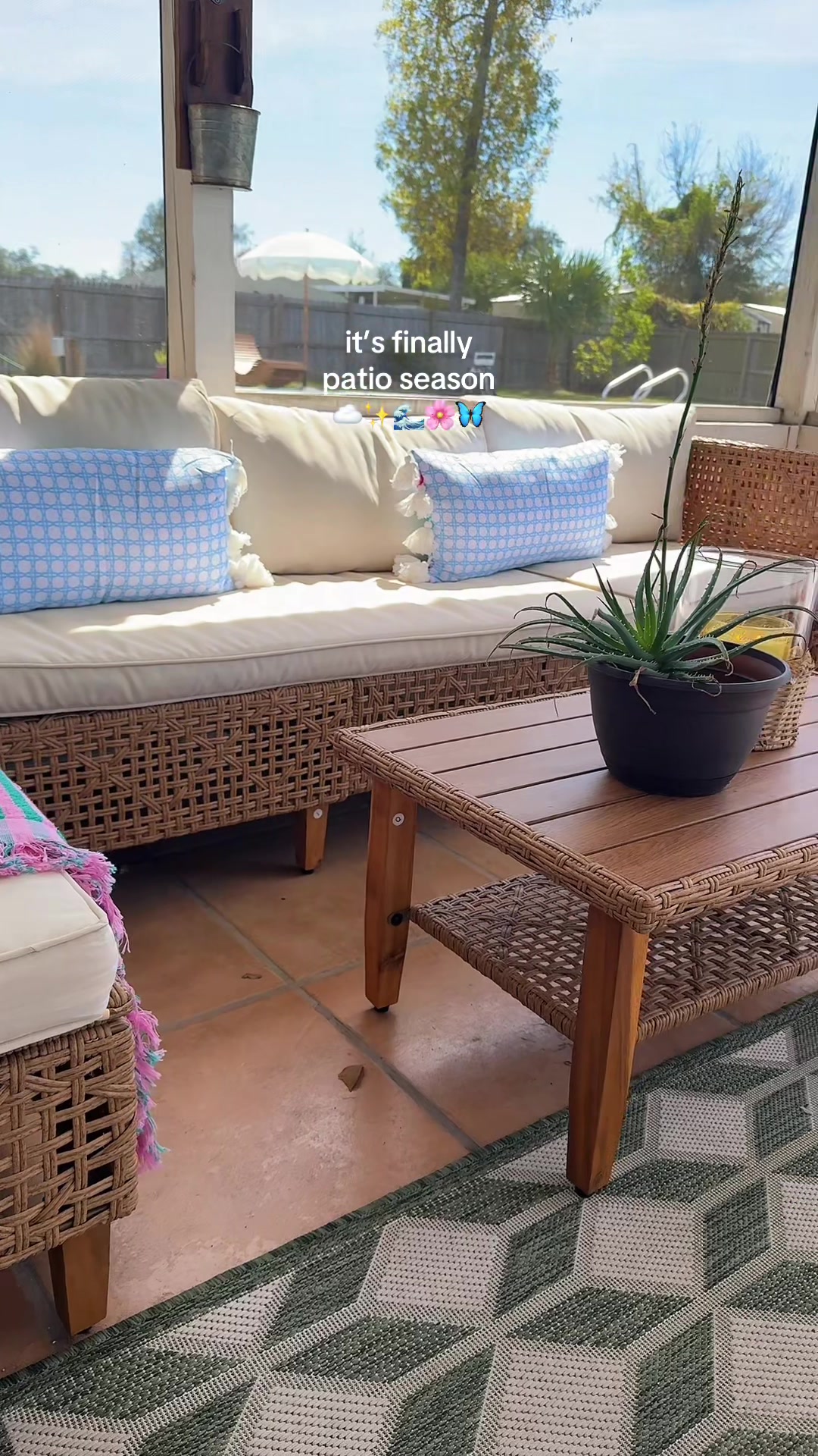 TikTok post by @southernpeachmama for Phi Villa. Caption reads: The prettiest patio couch ever ✨☁️ @PhiVillaUS....