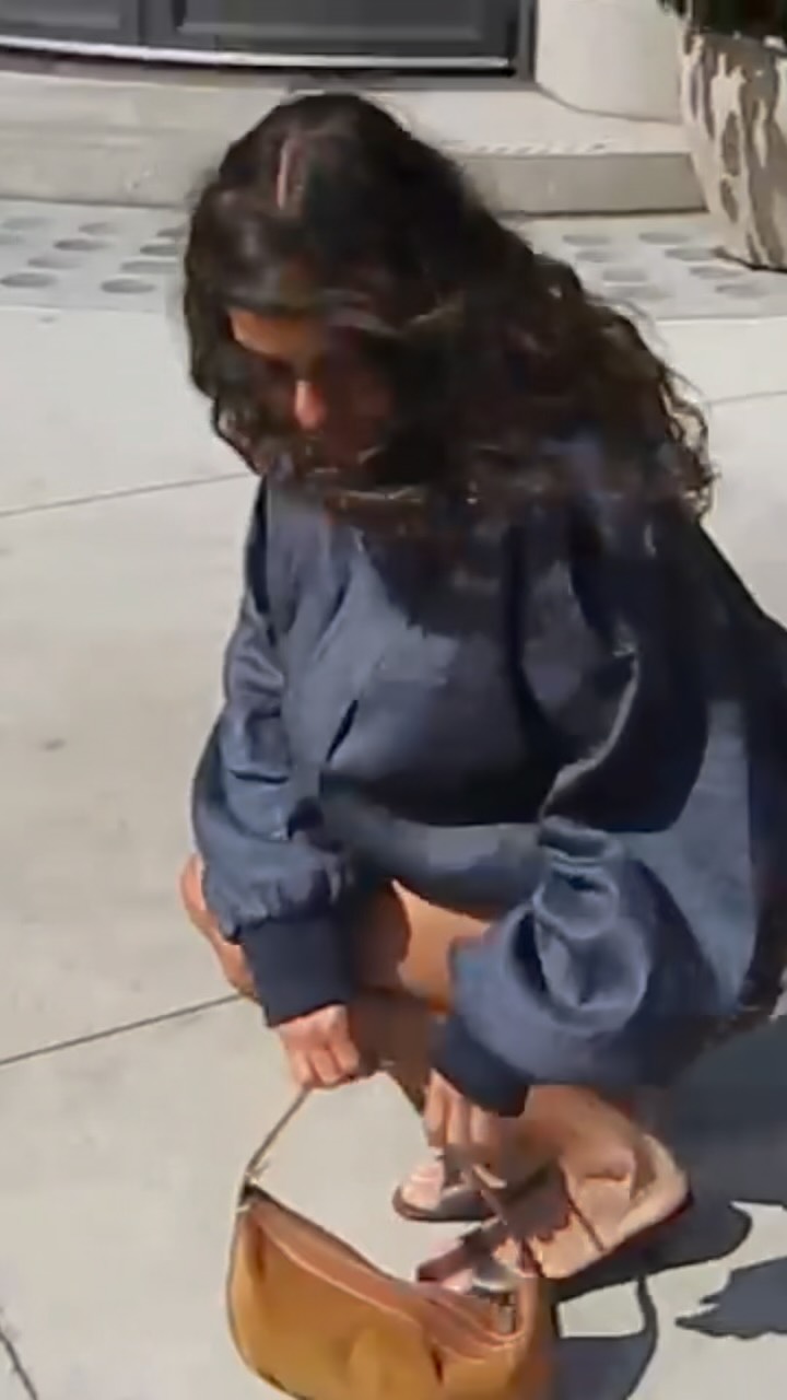 Instagram post by @charlotte.kpf for STAUD. Caption reads: Summer in the city @Staud.clothing #staudclothing....