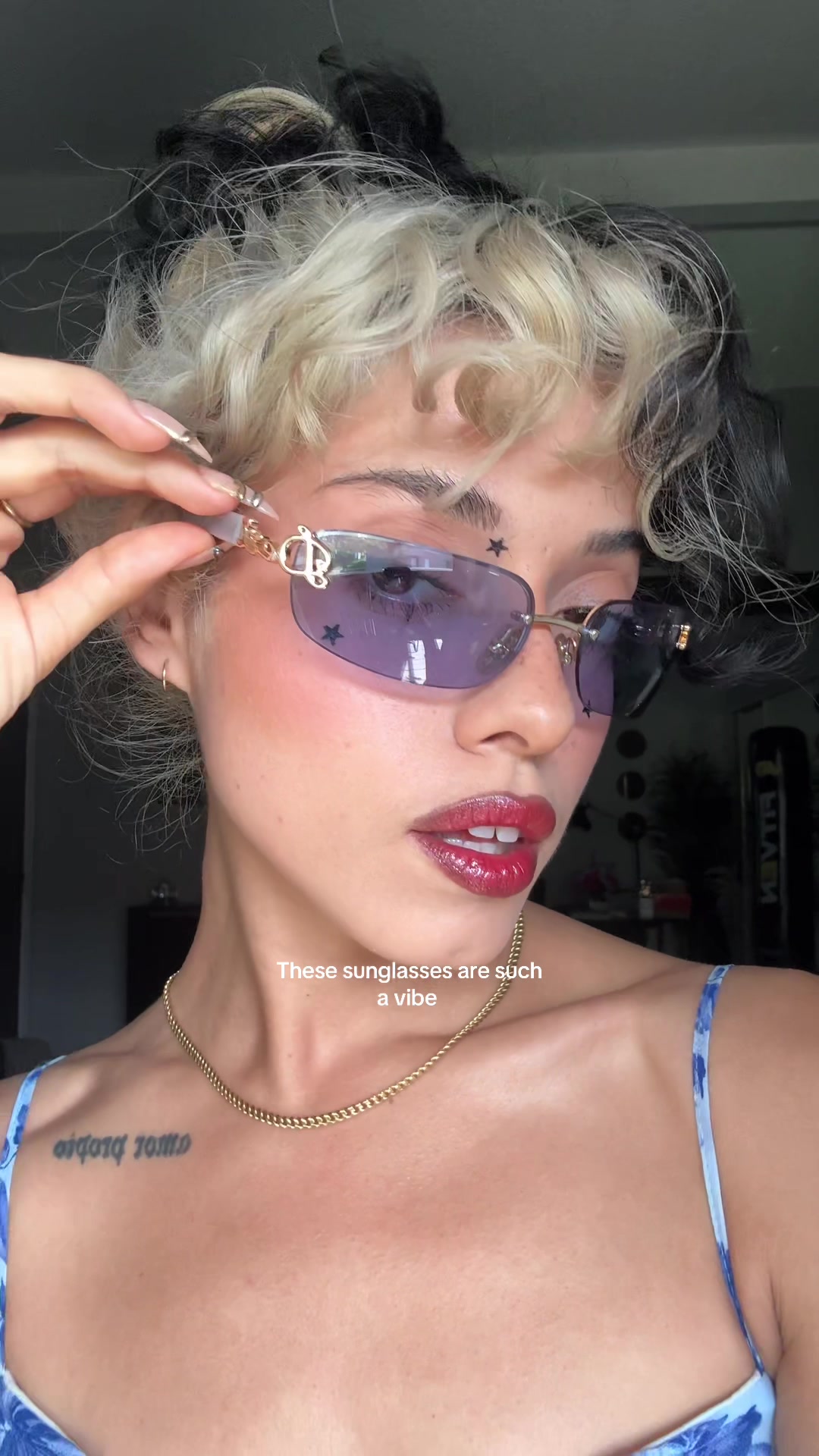 TikTok post by @yadeemarquez1 for DEZI. Caption reads: I LOVE THESE Y2K SUNGLASSES BY @DEZI EYEWEAR BABY....