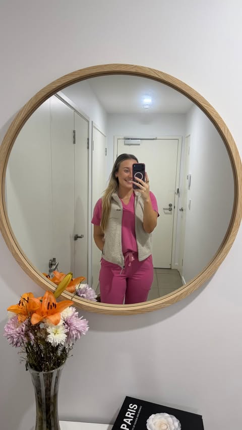 Instagram post by @studyvlogloz for FIGS. Caption reads: [...] @virginactiveaustralia 🤪!!! in @wearfigs as....