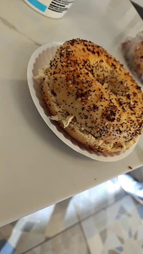 Instagram post by @rocksaikitty for Whole Foods Market. Caption reads: Sometimes the best bagels you make yourself.  Got....