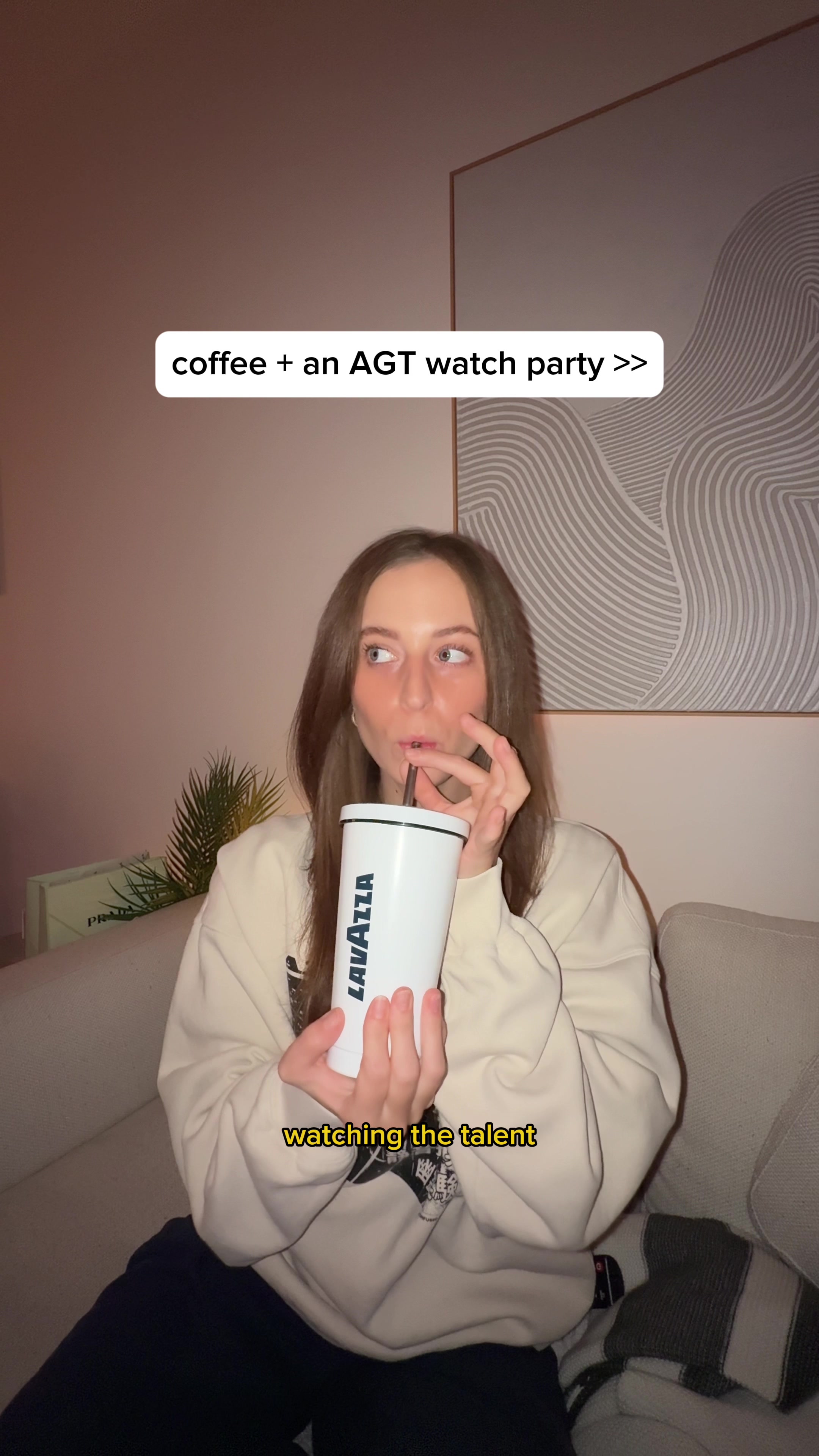 TikTok post by @reaganxo for Lavazza USA. Caption reads: HEY Join me & Watch #AGT Tuesdays 8/7c on @NBC and....