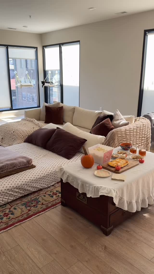 Instagram post by @sophiamarren for Apartments. Caption reads: #ad cozy halloween movie nights are even better at....