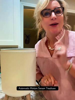 TikTok post by @susanfelts5 for Pukomc. Caption reads: Automatic Trash Can! #trash #bathroom @Pukomc....