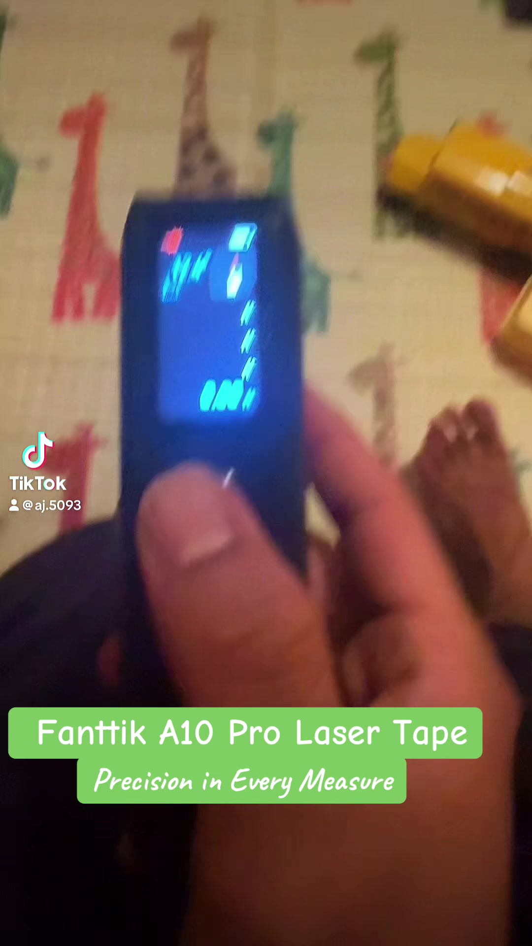 TikTok post by @aj.5093 for Fanttik. Caption reads: Fanttik A10 Pro 2-In-1 Digital Laser Tape Measure,....