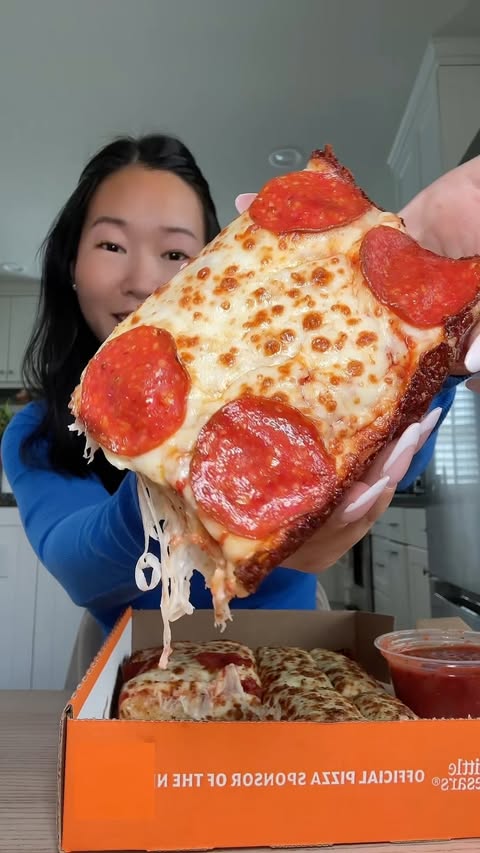 Instagram post by @biteswithesther for Little Caesars. Caption reads: #LittleCaesarsPartner The Detroit-Style....