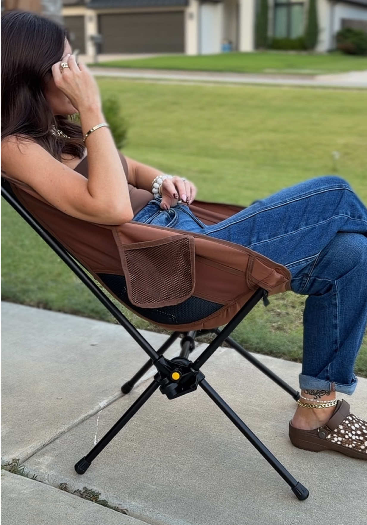 TikTok post by @lifeof.brandi for Fanttik. Caption reads: [...] #campingchair #outdoorrockingchair @Fanttik.