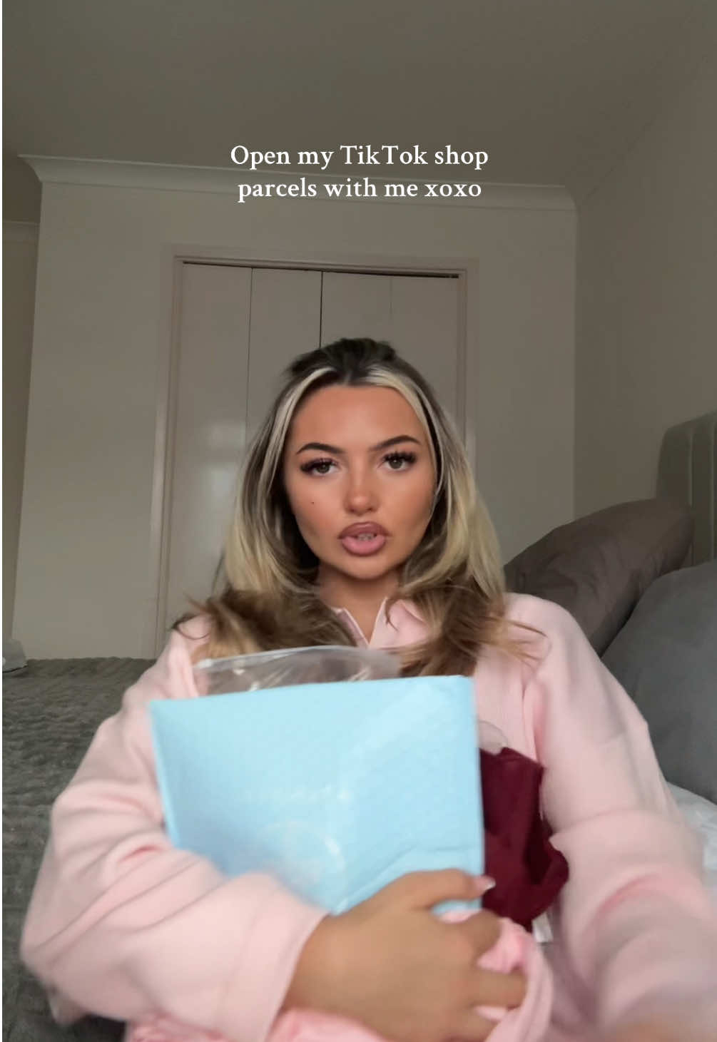 TikTok post by @lilgrimz for Hair Syrup. Caption reads: TikTok shop addiction continues @Moroccanoil....