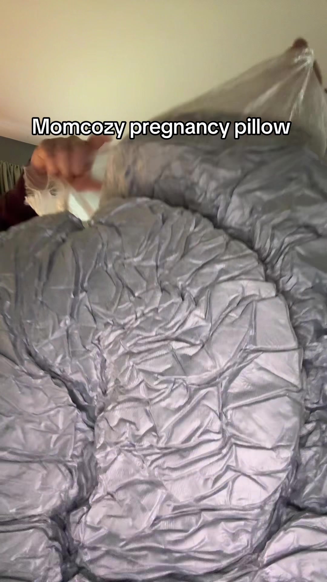 TikTok post by @dacceeyyyy for Momcozy. Caption reads: [...] #foryoupage #pregnant #pregnancypillow....