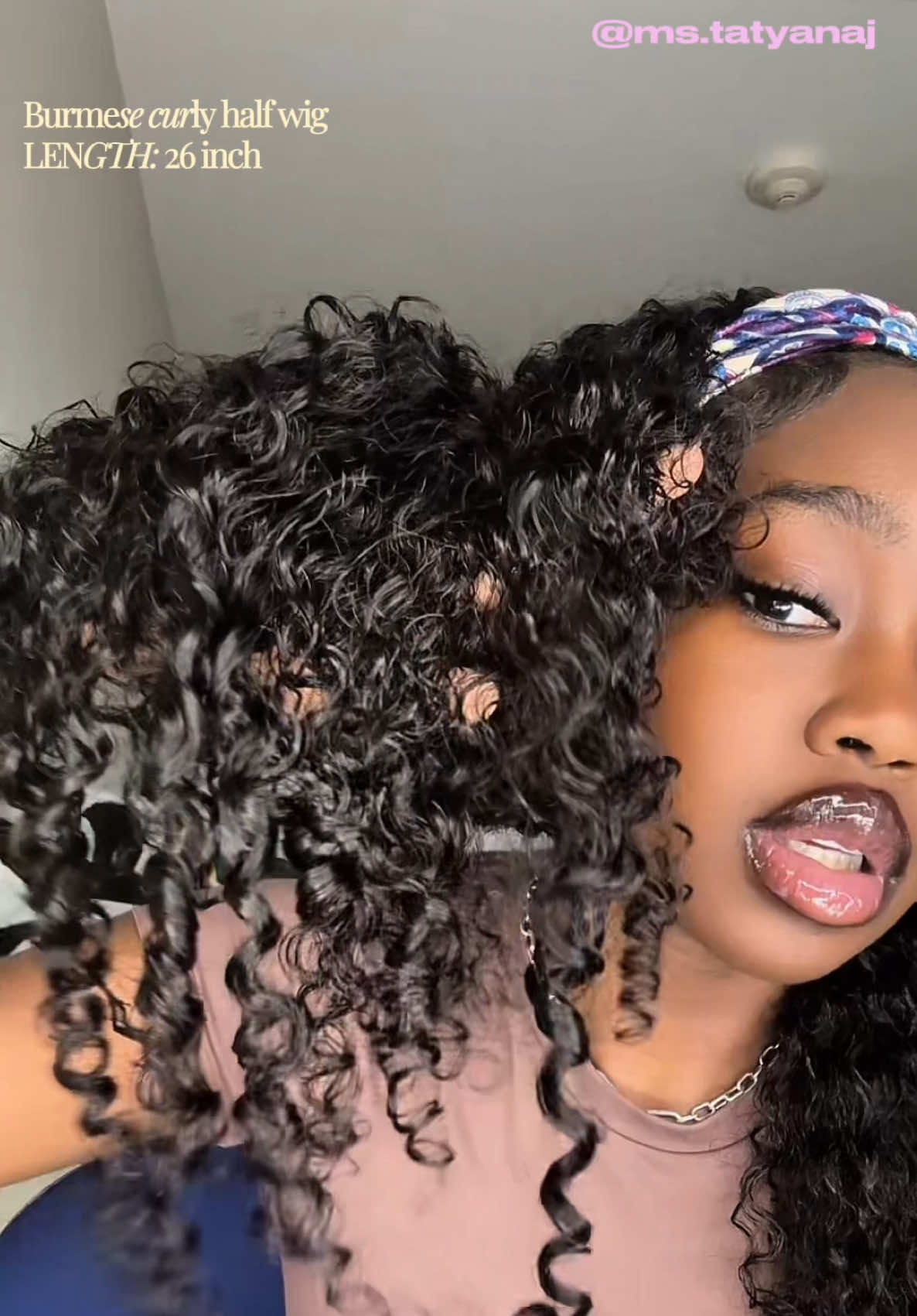 TikTok post by @ms.tatyanaj for Sterly Hair Shop. Caption reads: Burmese curly half wig in....