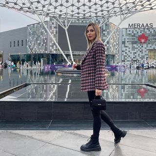Instagram post by @dima_al_haj for Nine West. Caption reads: "لربما أنت باحث في الأغصان  عما لا يظهر إلا في....