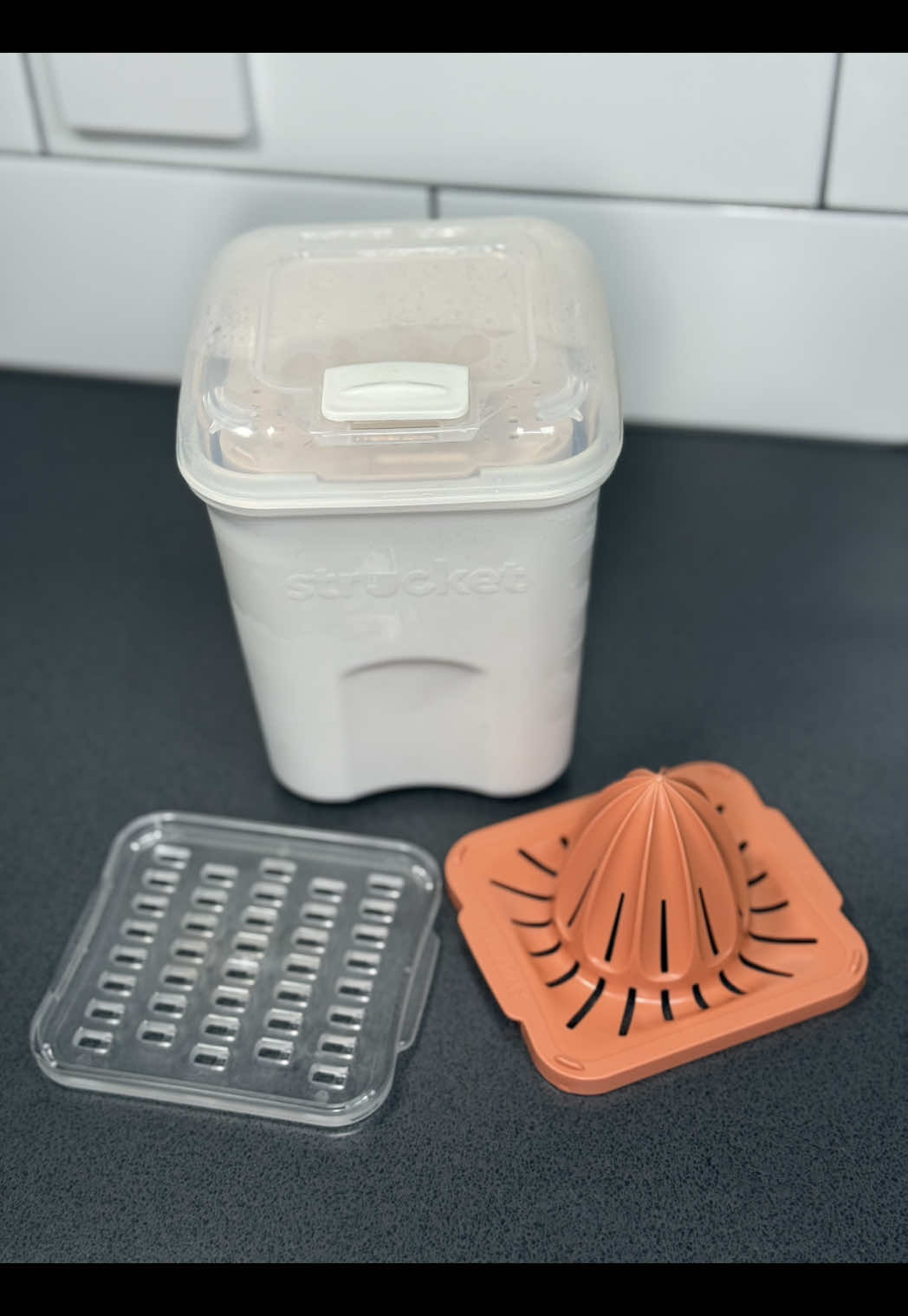 TikTok post by @kelnorman for Strucket. Caption reads: My little kitchen sidekick 💚 The @Strucket |....