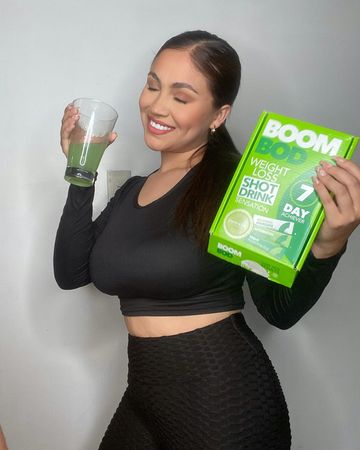 Instagram post by @arivdna for BOOMBOD. Caption reads: #ad @boombod is back to help with my summer [...].