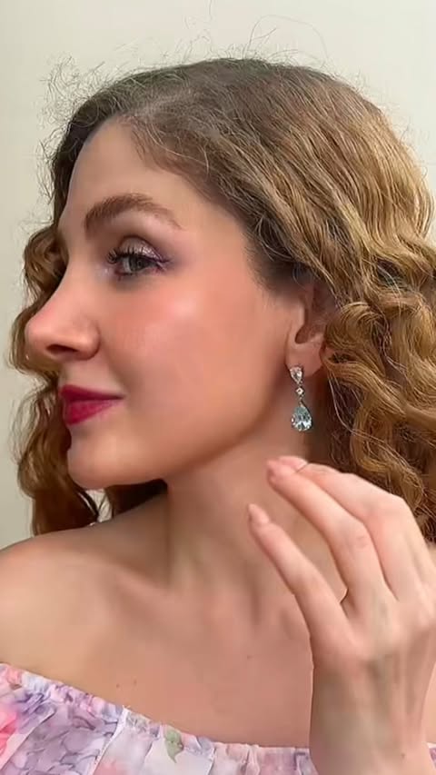 Instagram post by @tikuna.tiku for Sayabling Jewelry. Caption reads: [...] dreamy blue crystal drops from....