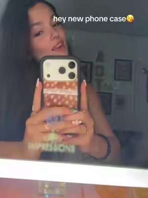 TikTok post by @tiffanybjones for Wildflower Cases. Caption reads: [...] #deerprint #phonecase #trend #ad @Wildflower....