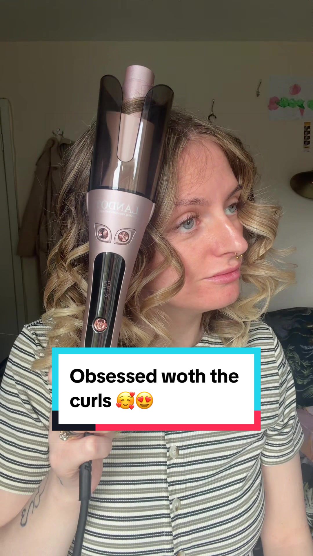 TikTok post by @kerie_mumof4 for Landot Beauty. Caption reads: Just look at those curls 😱 I love this automatic....
