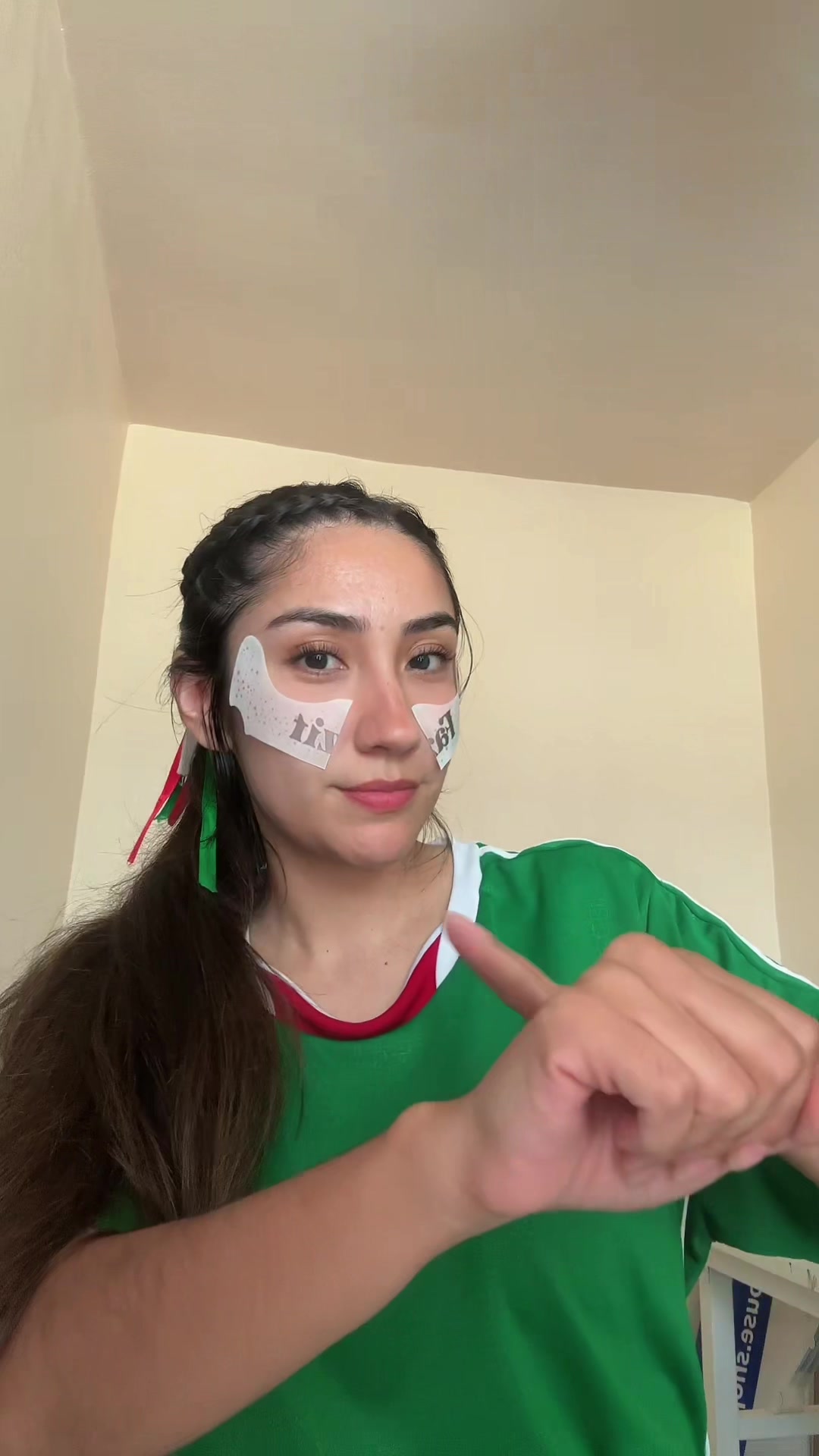 TikTok post by @officialrubydee for Fazit. Caption reads: my fave game day freckles 💚🤍❤️ @Fazit #gameday....