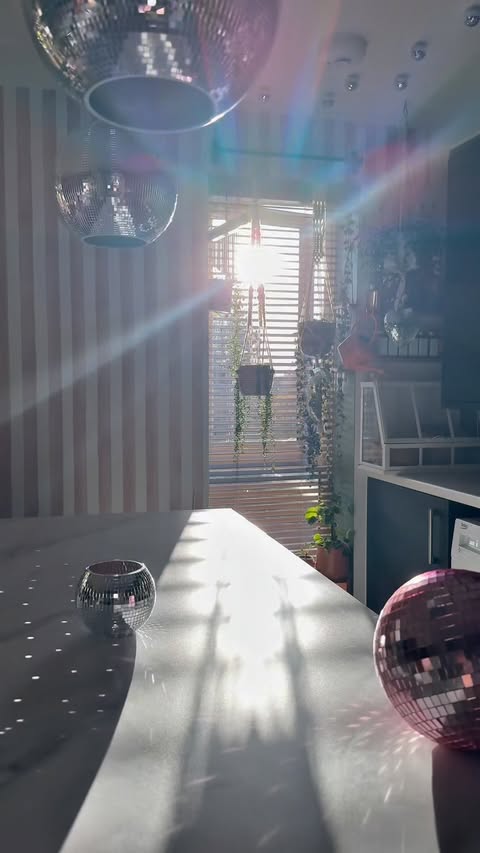 Instagram post by @abigailmarpi for Dunelm. Caption reads: zero wires, all the vibes 🪩💡✨

 lamp &....