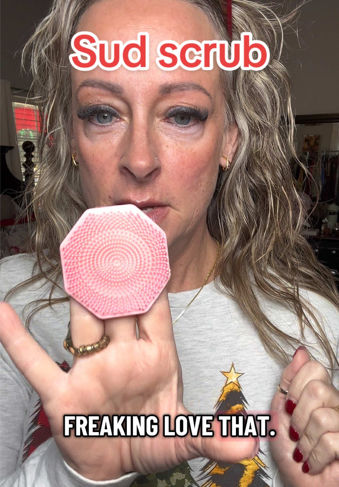 TikTok post by @hollydharris for Sud Scrub. Caption reads: #facescrub @Sud Scrub® #facewash.